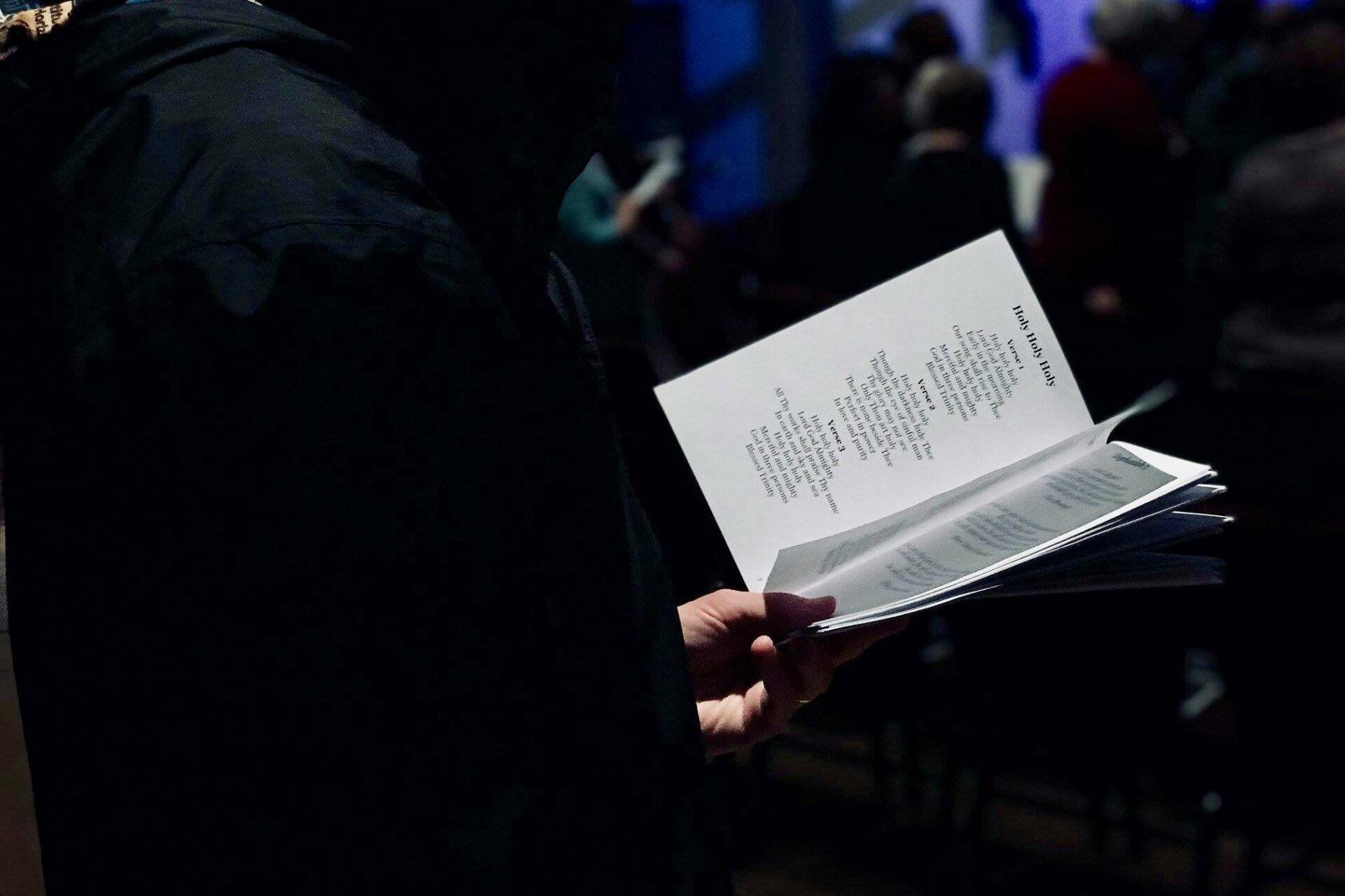 Person reading hymn