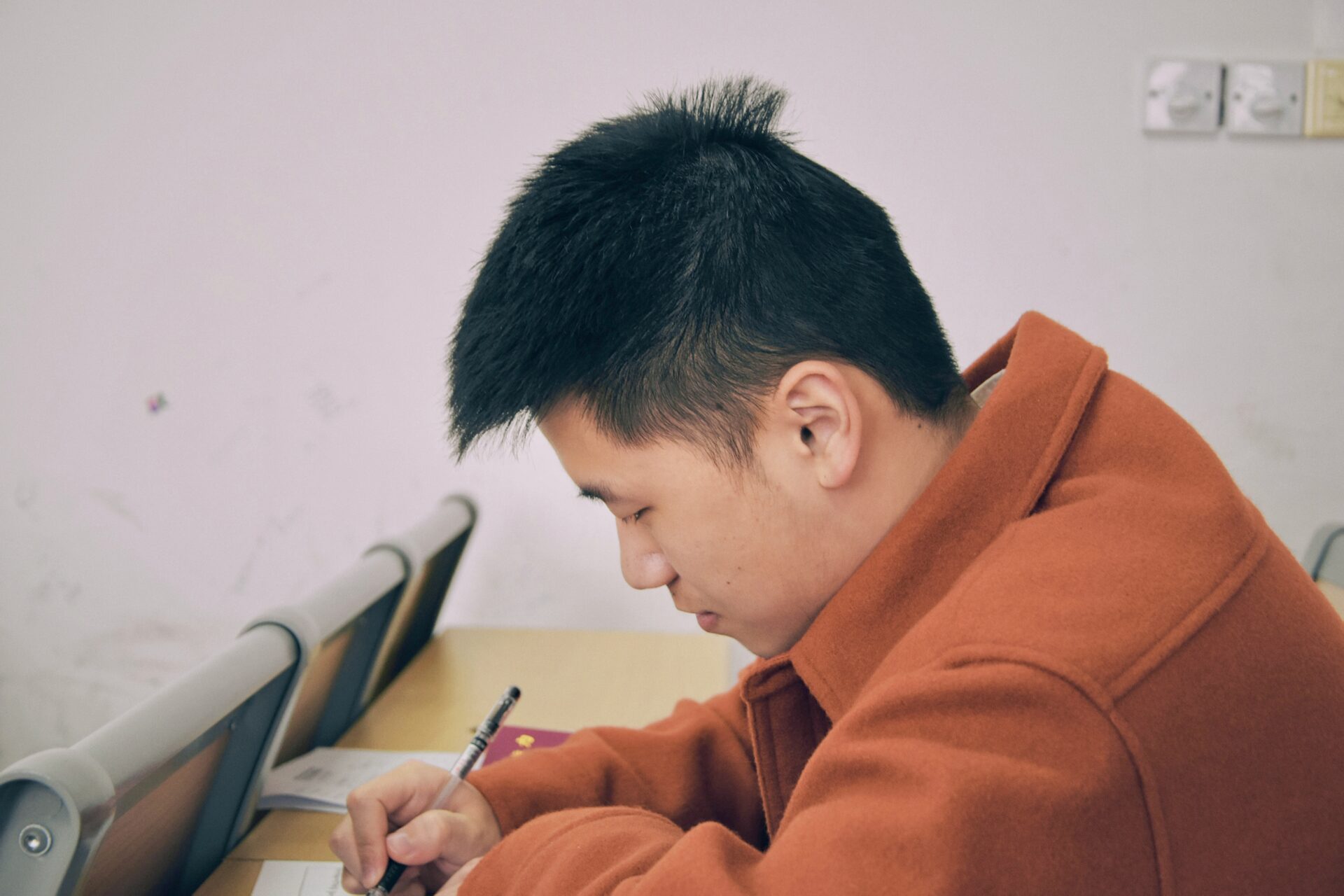 Person writing a note